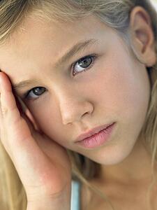 Portrait Of Girl Looking Sad