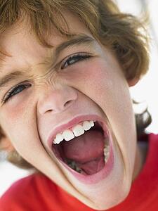 Portrait Of Boy Shouting
