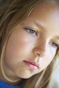 Portrait Of Girl Looking Depressed