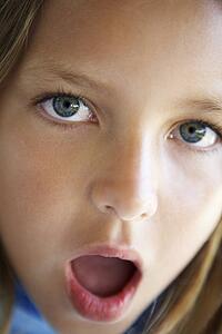 Portrait Of Girl Looking Surprised