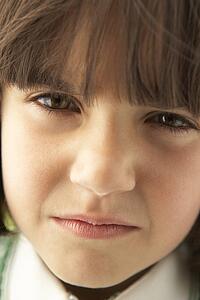 Portrait Of Girl Frowning