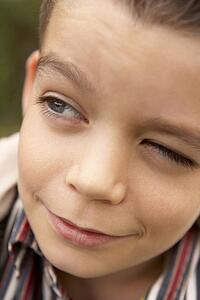 Portrait Of Boy Looking Hopeful