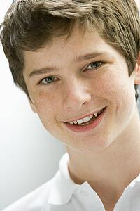 Portrait Of Teenage Boy Smiling