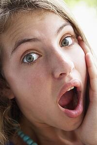Portrait Of Teenage Girl Looking Shocked