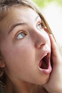 Portrait Of Teenage Girl Looking Shocked