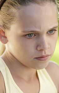 Portrait Of Girl Looking Upset