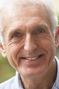 Portrait Of Senior Man Smiling At The Camera