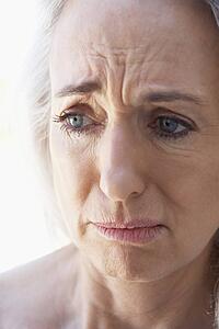 Portrait Of Senior Woman Looking Anxious