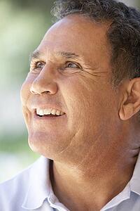 Portrait Of Senior Man Smiling Happily