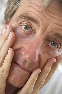 Portrait Of Senior Man Looking Worried