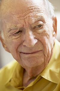 Portrait Of Senior Man Frowning