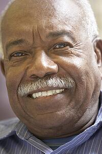 Portrait Of Senior Man Smiling At The Camera