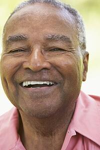 Senior Man Laughing At The Camera