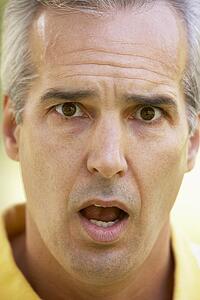 Portrait Of Surprised Middle Aged Man