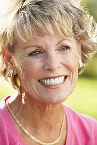 Portrait Of Senior Woman Smiling Happily