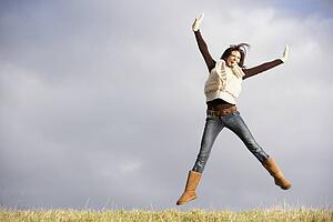 Young Woman Jumping In Air