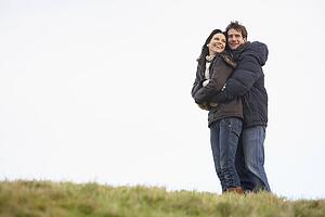 Couple Embracing In Park