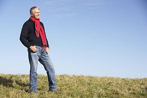 Senior Man Standing In Park