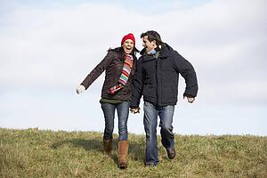Couple Running In The Park