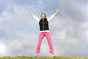 Senior Woman Jumping In The Air