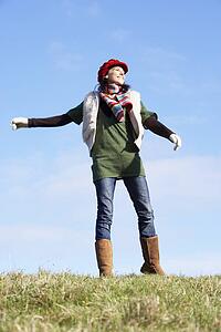 Young Woman Standing In Park