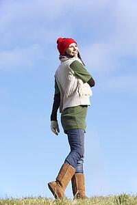 Young Woman Standing In Park