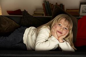 Young Girl Watching Television