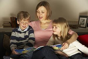 Mother And Children Reading
