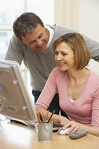 Couple Using Computer