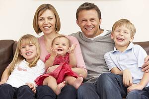 Family Group On Sofa