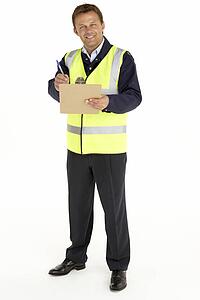 Courier Writing On A Clipboard