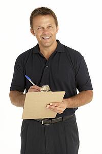 Courier Writing On A Clipboard
