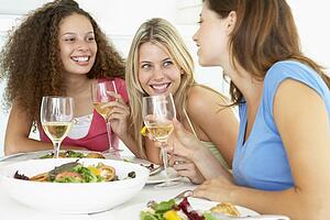 Friends Having Lunch Together At Home