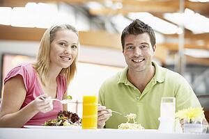 Couple Having Lunch At The Mall