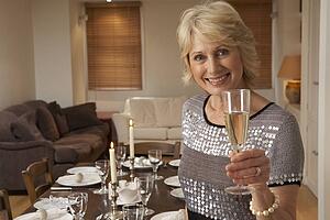 Woman Throwing A Dinner Party
