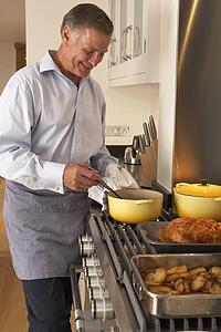 Man Cooking At Home