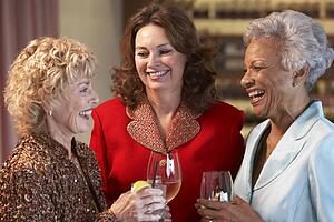 Friends Socializing At A Bar