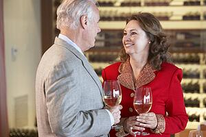 Couple Enjoying A Drink At A Bar Together