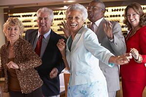 Couples Dancing Together At A Nightclub