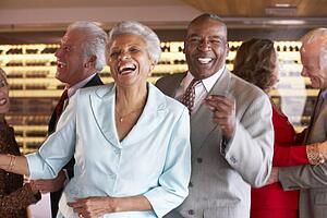 Couples Dancing Together At A Nightclub