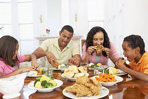 Family Having A Meal Together At Home