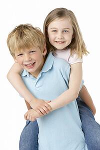 Brother And Sister Playing And Smiling