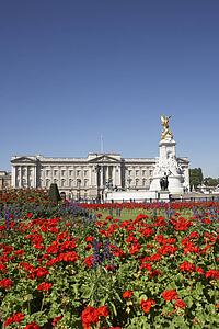 Buckingham Palace With Flowers Blooming In The Queen's Garden, London, England