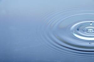 Concentric Circles Forming In Still Water