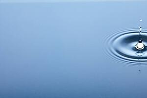 Concentric Circles Forming In Still Water