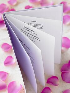 Wedding Booklet Surrounded By Rose Petals