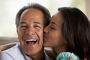 Father And Daughter Together At Home
