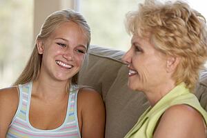 Mother And Daughter Together At Home