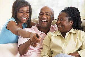 Family Watching Television Together