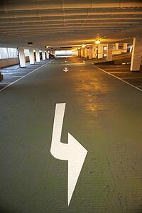 Directional Arrow In A Carpark Building